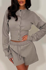 crop button up sweatshirt with cinched waist and shorts tracksuit two piece co ord set airport outfit whitefox uk styledup