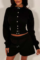 crop button up sweatshirt with cinched waist and shorts tracksuit two piece co ord set airport outfit whitefox uk styledup
