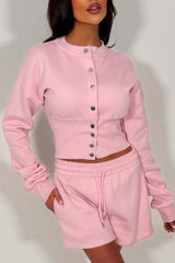 crop button up sweatshirt with cinched waist and shorts tracksuit two piece co ord set airport outfit whitefox uk styledup