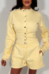 crop button up sweatshirt with cinched waist and shorts tracksuit two piece co ord set airport outfit whitefox uk styledup