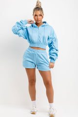 womens runner shorts and crop zip hoodie with ruched sleeves tracksuit set