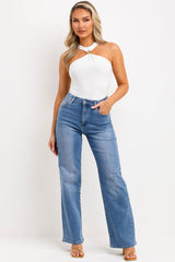 womens white bodysuit top with gold buckle styledup