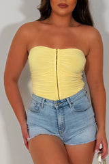 yellow hook and eye corset top 