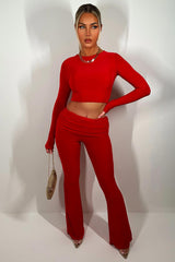 womens skinny flared fold over detail trousers and top going out two piece set day to night outfit red
