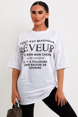 womens white t shirt with reveur slogan
