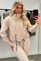 beige funnel neck jacket with drawstrinh hem styledup uk