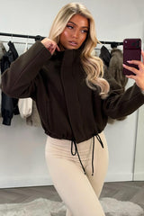 brown funnel neck jacket with drawstrinh hem styledup uk