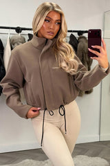 womens taupe funnel neck jacket with drawstring hem long sleeves zara uk everyday jacket styledup uk