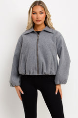 womens grey puffed bomber jacket with front double welt pockets zara womens uk 