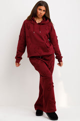 womens hoodie and joggers tracksuit set with crosses