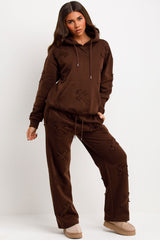 womens distressed cross hoodie and joggers set loungewear styled up