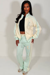 womens zip up sweatshirt and wide leg joggers tracksuit airport outfit styledup