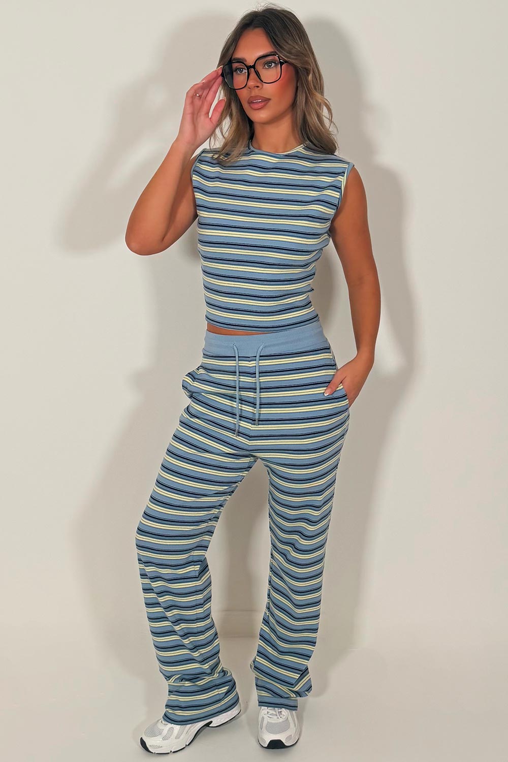 striped sleeveless ribbed top and wide leg trousers two piece co ord set blue airport outfit styledup 