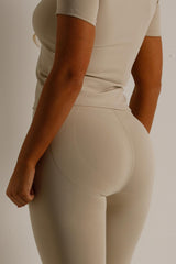 skims womens sports short sleeve top and leggings two piece set