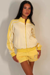 womens short tracksuit with c emblem styledup airport outfit zara uk