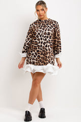 womens oversized leopard print sweatshirt with frill hem and long sleeves