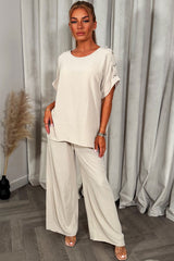 christmas party co ord with gold button shoulder top and trousers outfit for womens