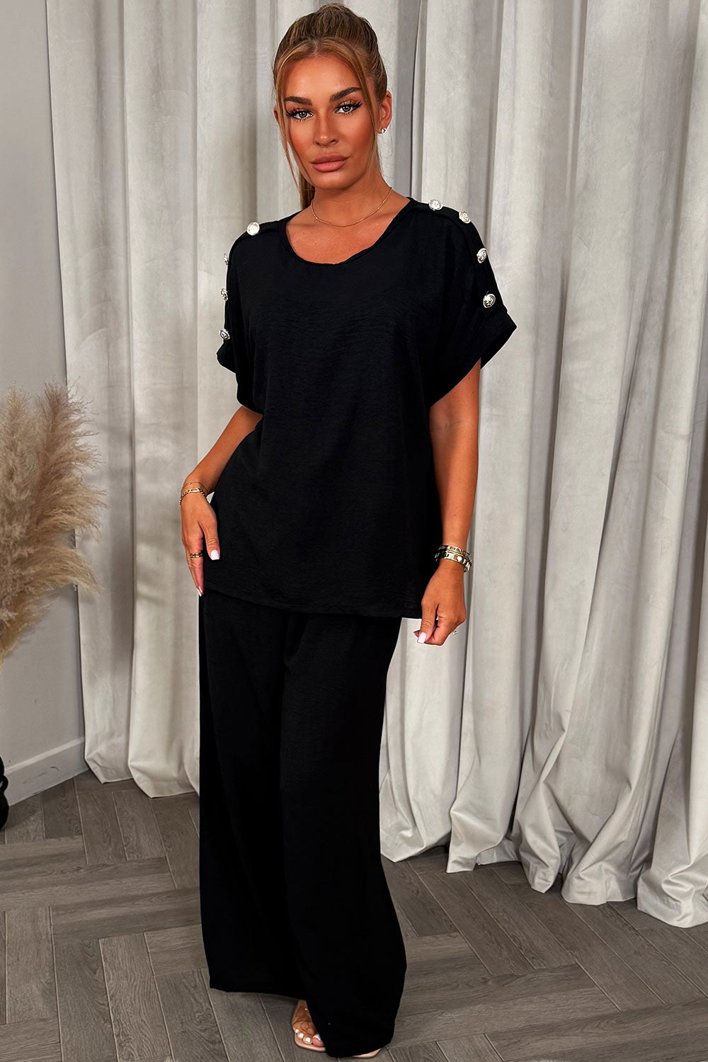 christmas party co ord with gold button shoulder top and trousers outfit for womens