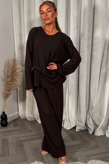 womens brown long sleeve top and trousers co ord set with gold buckle 