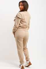 frill shoulder gold button top and trousers two piece tracksuit set airport outfit