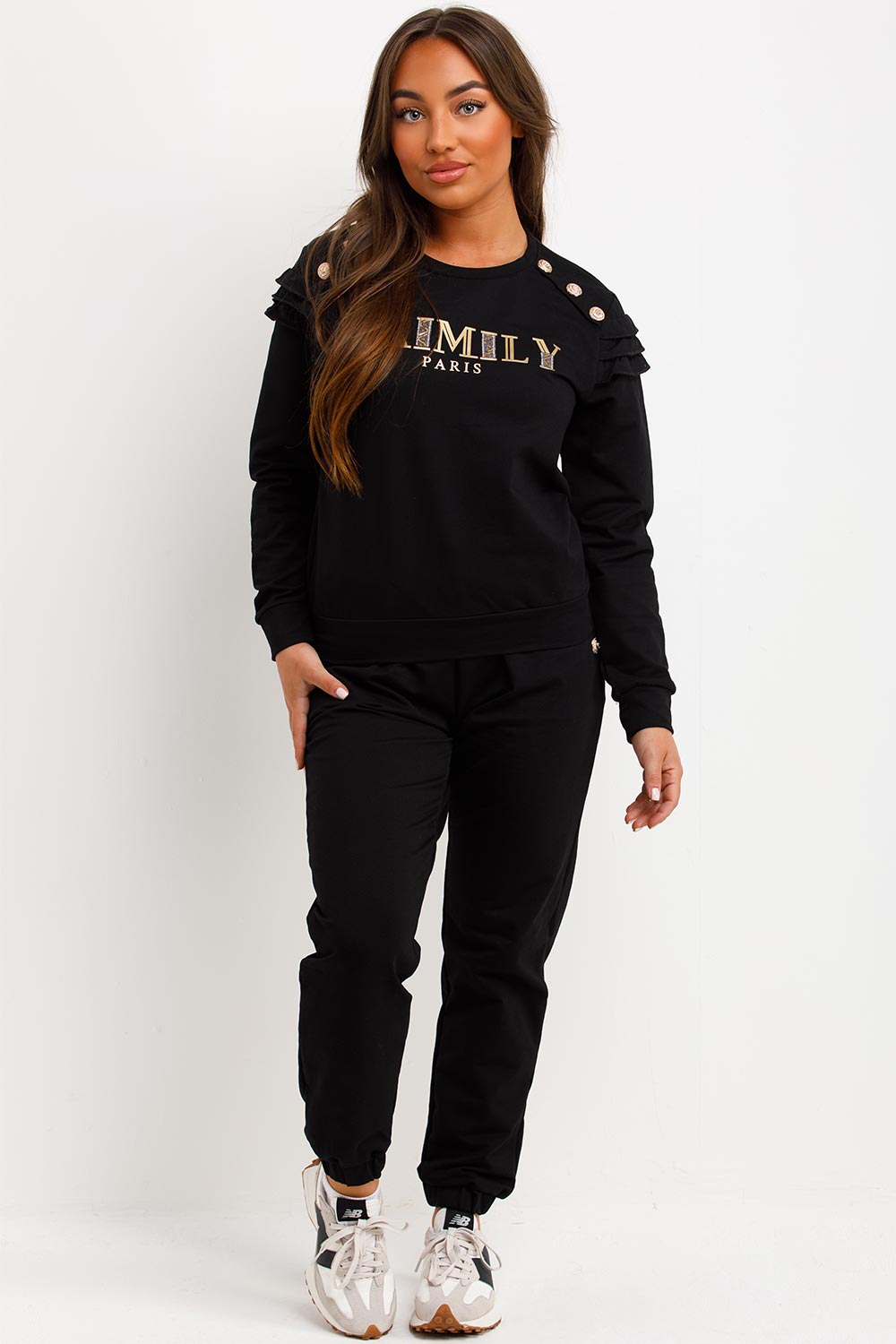 womens tracksuit with gold button and ruffle frill shoulders baimily paris slogan