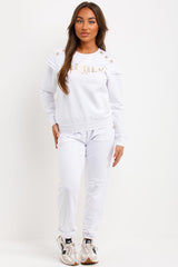 frill shoulder gold button top and trousers two piece tracksuit set airport outfit