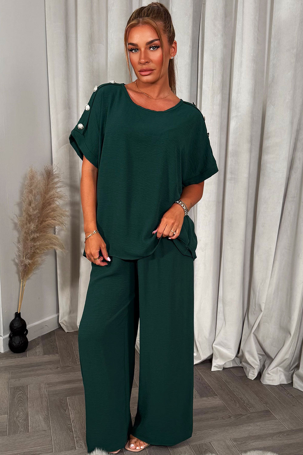 womens oversized top with gold button detail and matching wide leg trousers co ord set christmas party outfit