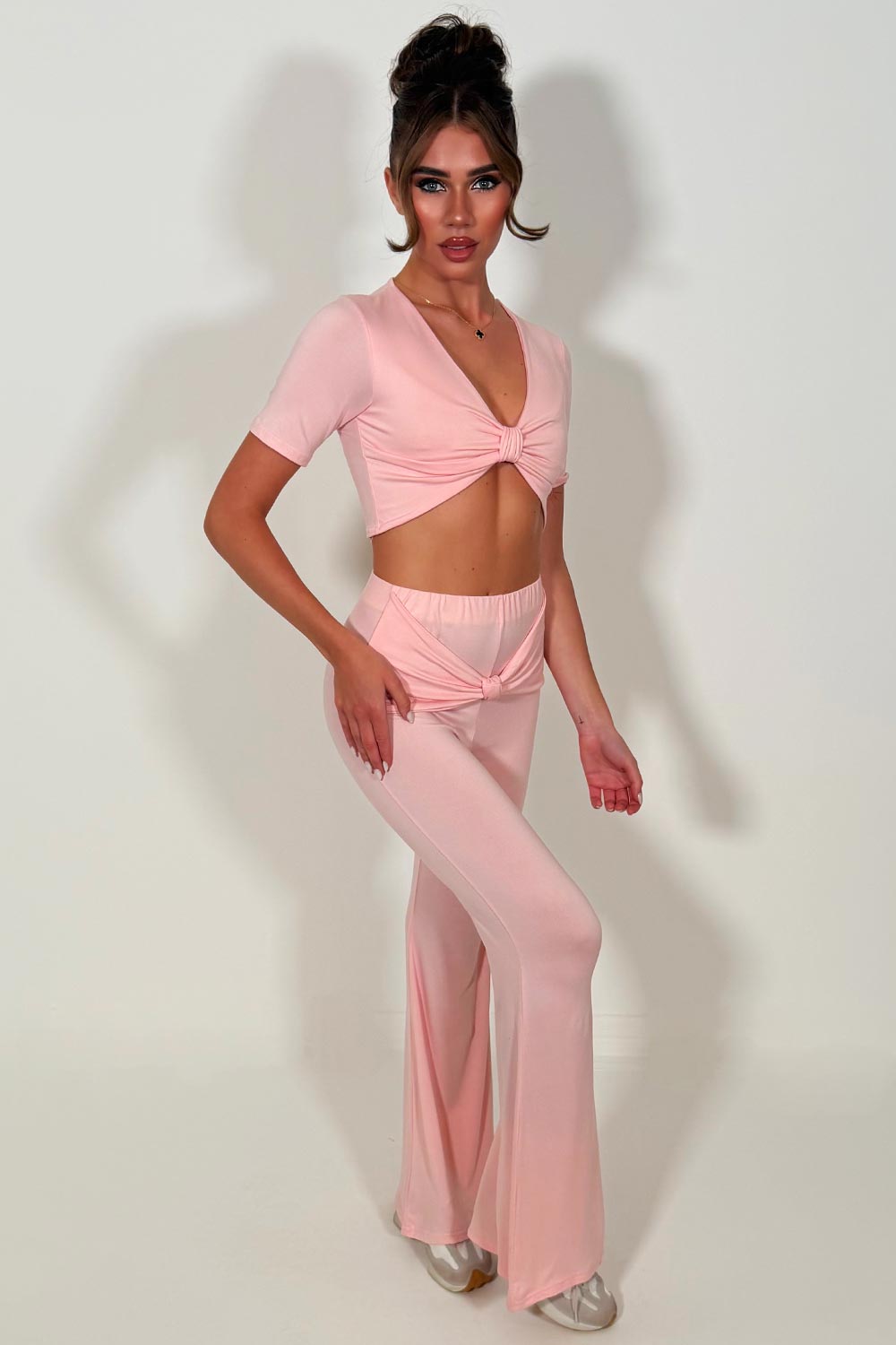 womens pink wide leg flare trousers with knot front detail and crop top two piece co ord set casual outfit styledup 