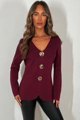 knitted jumper with gold buttons on the front for womens