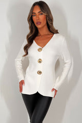 long sleeve gold button knitted jumper styled up 