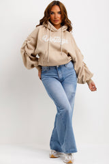 womens vintage hoodie sweatshirt with ruched sleeves styled up