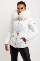 womens white puffer jacket with fur hood and belt styledup fashion