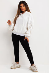 womens oversized hooded sweatshirt with ruched gathered sleeves