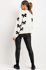 womens knitted jumper with long sleeves bows and diamantes