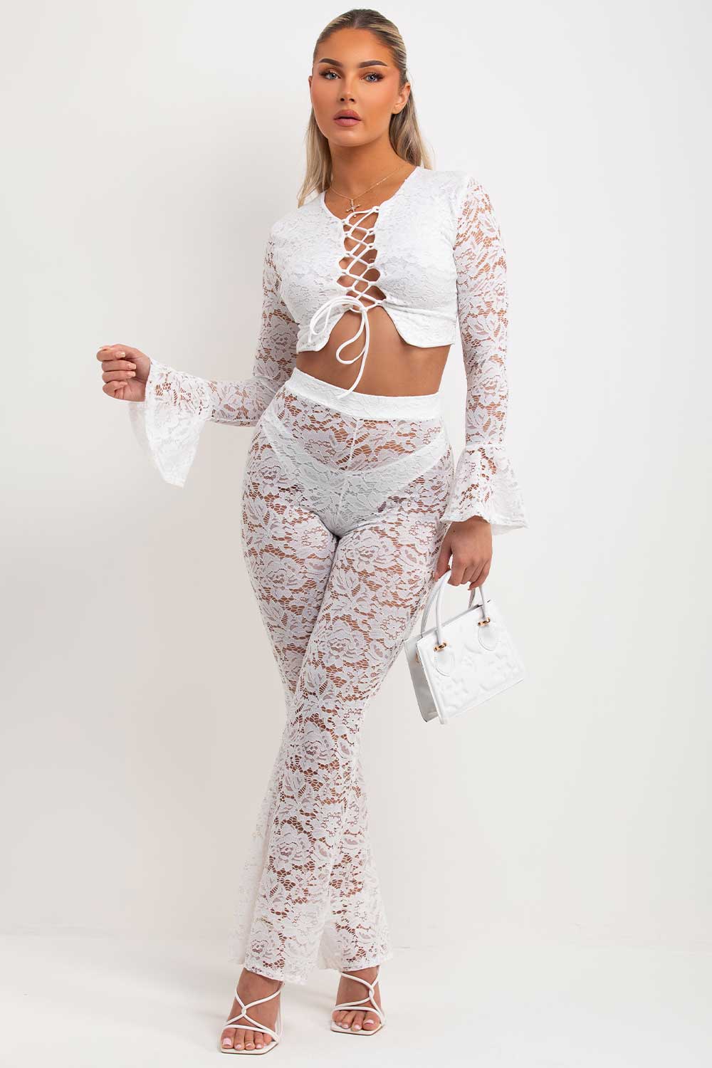 womens lace flare trousers and long flare sleeve lace up front crop top co ord set going out summer holiday rave festival outfit