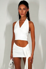 halterneck top with crochet trim and mini drape skirt co rod set white