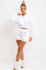 crop zip hoodie with ruched sleeves and shorts tracksuit set