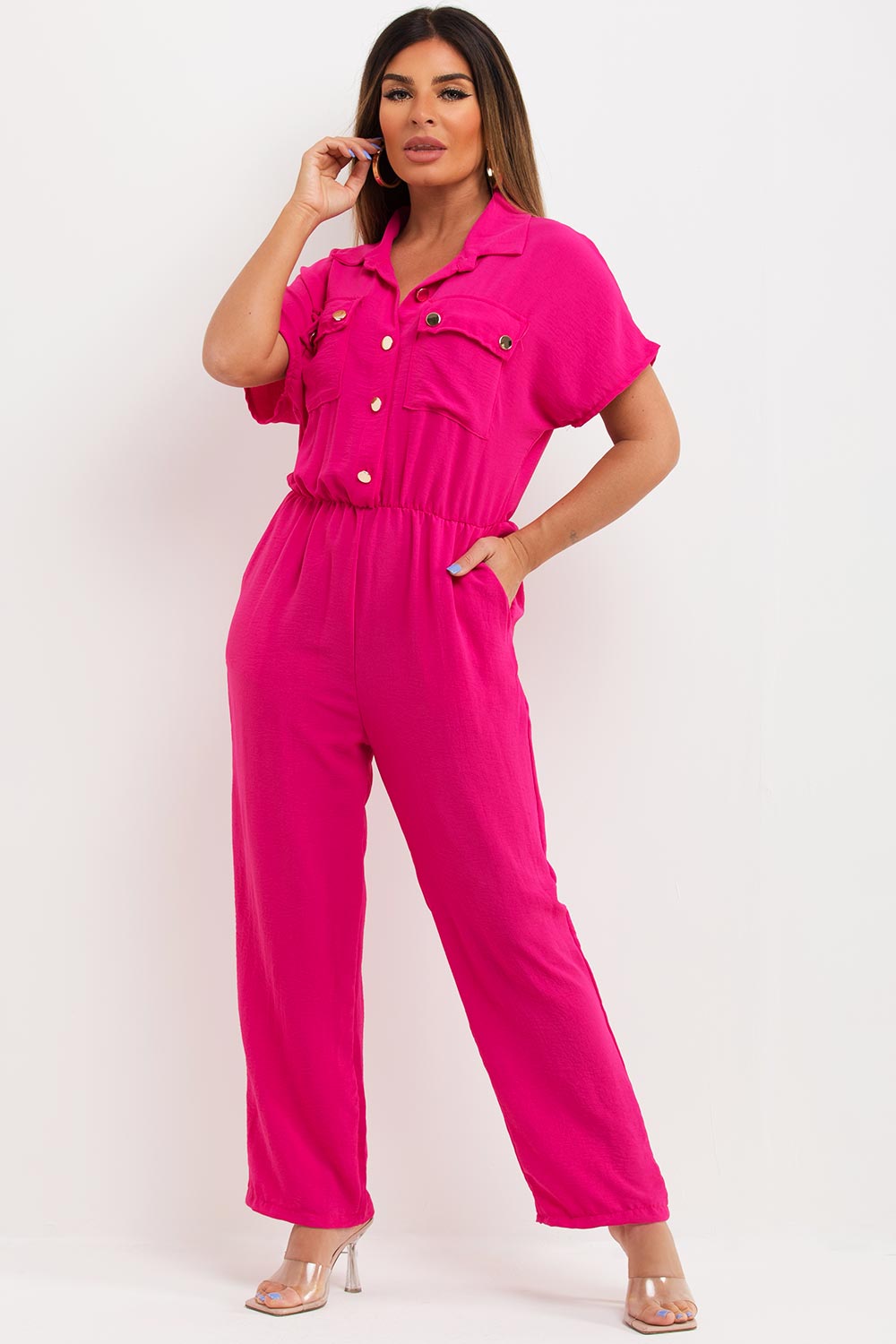 utility jumpsuit with gold buttons and wide legs