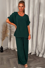 gold button shoulder top and trousers co ord set christmas party outfit