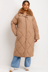 womens long winter coat with faux fur collar and drawstring waist styledup