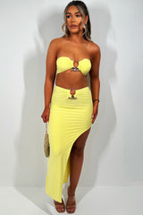 yellow maxi skirt with side cut and bandeau top with gold buckle two piece co ord set