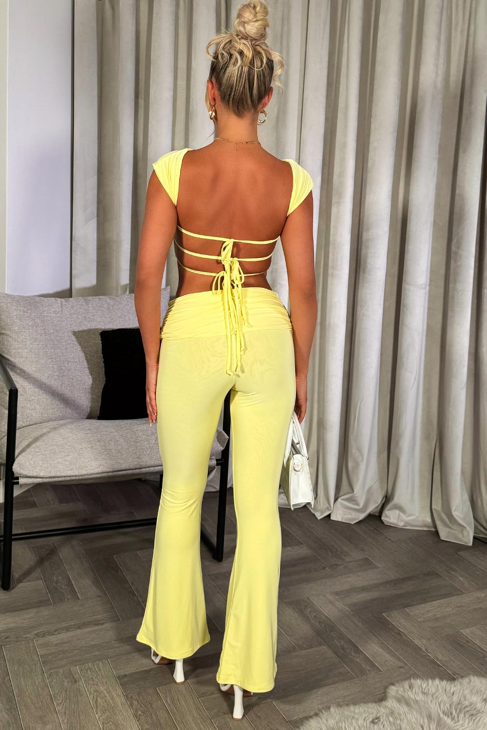 fold over detail skinny flare trousers and backless crop top co ord set going out summer occasion outfit