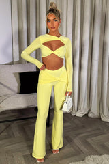 flare trousers and long sleeve crop top co ord set yellow going out outfit