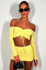slinky short skirt and off shoulder long sleeve crop top co ord set going out summer festival outfit