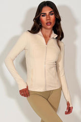 beige long sleeve lulumenon sports jacket 