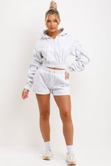 womens runner shorts and crop zip hoodie with ruched sleeves tracksuit set