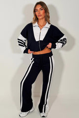 womens black tracksuit zip up sweatshirt top & wide leg jogger airport outfit with stripe detail