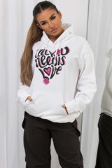 womens hoodie with all you need is love slogan
