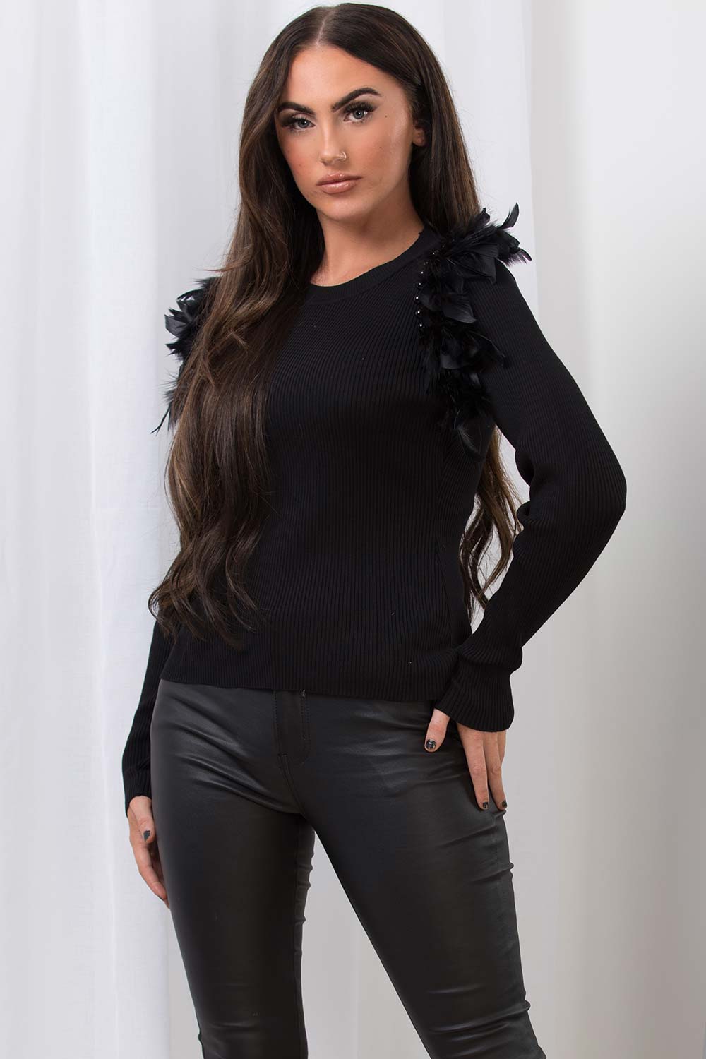 womens black jumper with feathers and pearls