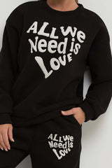 womens oversized sweatshirt and joggers co ord set with all we need is love towelling